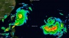 Gradually weakening Typhoon duo