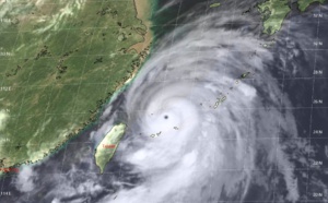 Gradually weakening Typhoon duo